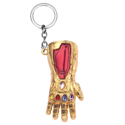 Porte-clés gant de l’infini Thanos Marvel doré avec pierres colorées.